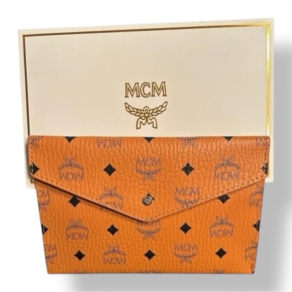 MCM Handbags - MCM 🪢 NIB! Novelty Visetos Monogram Envelope Clutch in Cognac
